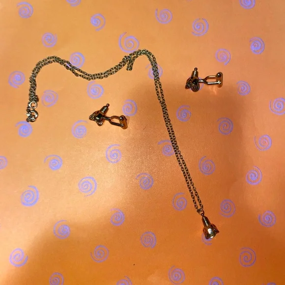 Elegant Gold Chain Necklace with Unique Charms